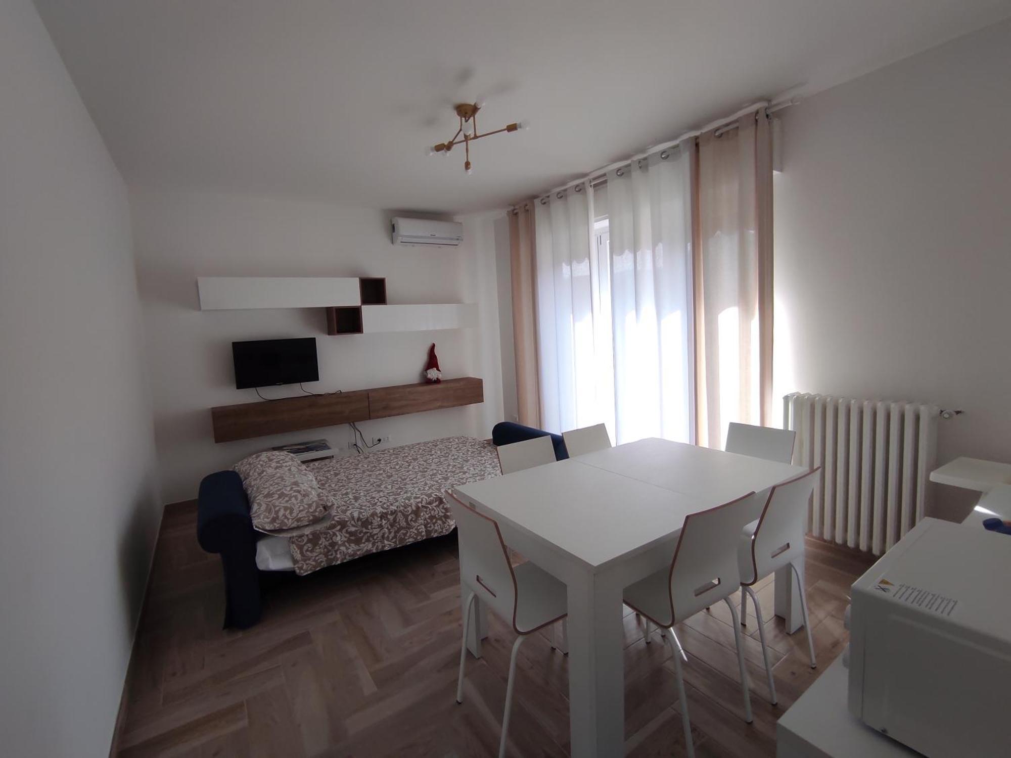 Residenza Gattoni Apartment Оменя Екстериор снимка